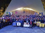 Desfile de collas en Elda, iniciando la Media Fiesta y el 75 aniversarios de los Moros y Cristianos